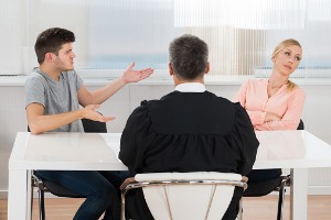 An arguing couple visiting a Family Law Attorney in Peoria IL