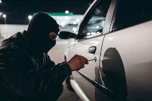 Image of a Masked Individual Committing Car Felonies, Peoria IL