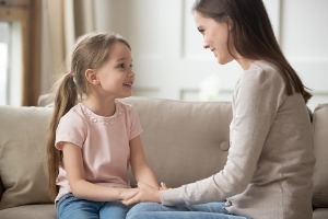 Mother Talking to Daughter Before Visiting a Child Custody Attorney in Peoria IL