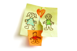 A post it note with a sad family, ripped apart and a small boy in the middle, representing a Child Custody Attorney in Bloomington IL